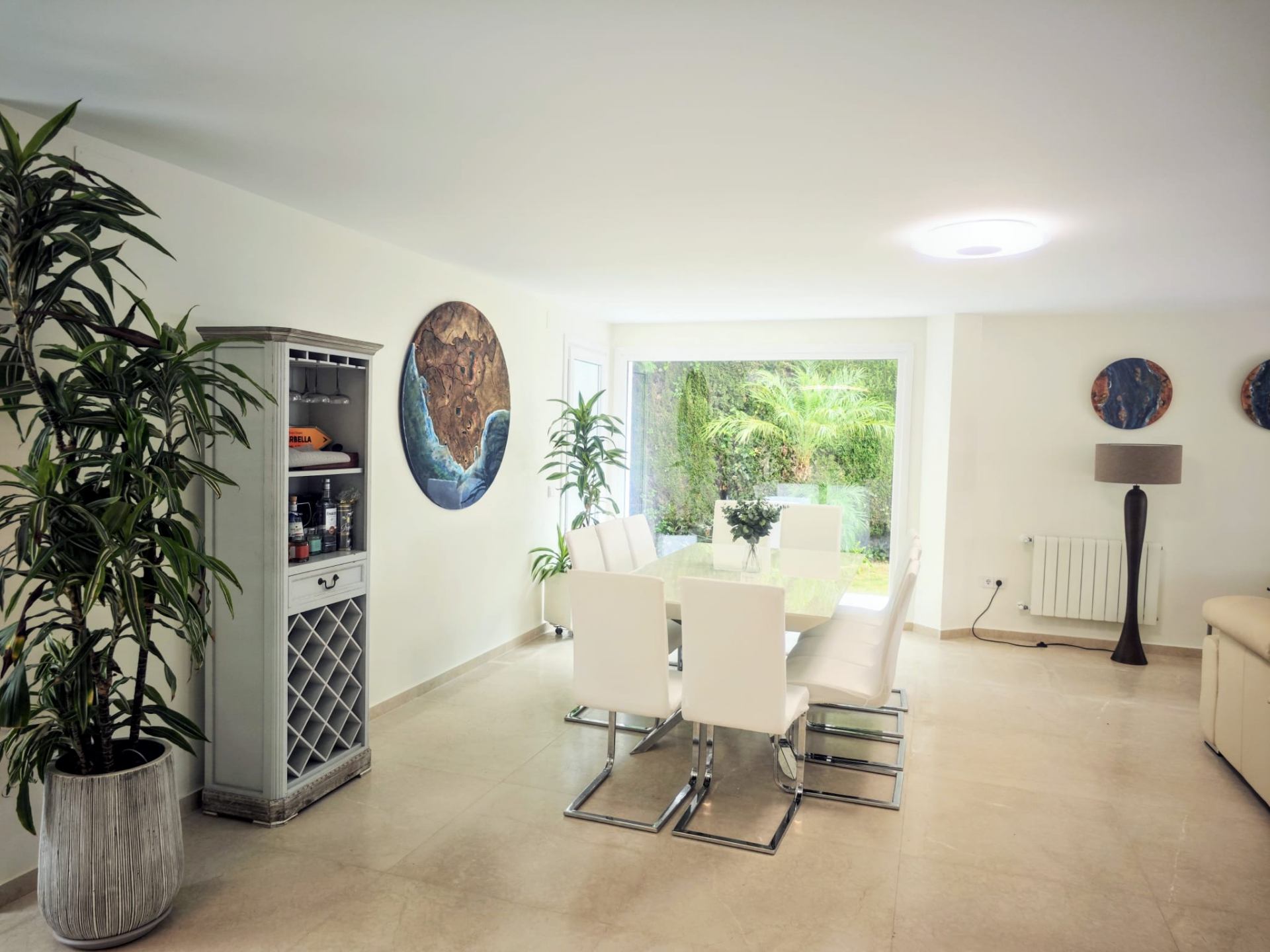 Formal dining area for eight with garden outlook and curated styling